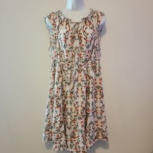 Torrid White with orange flowers dress